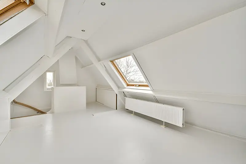 attic with white painted walls